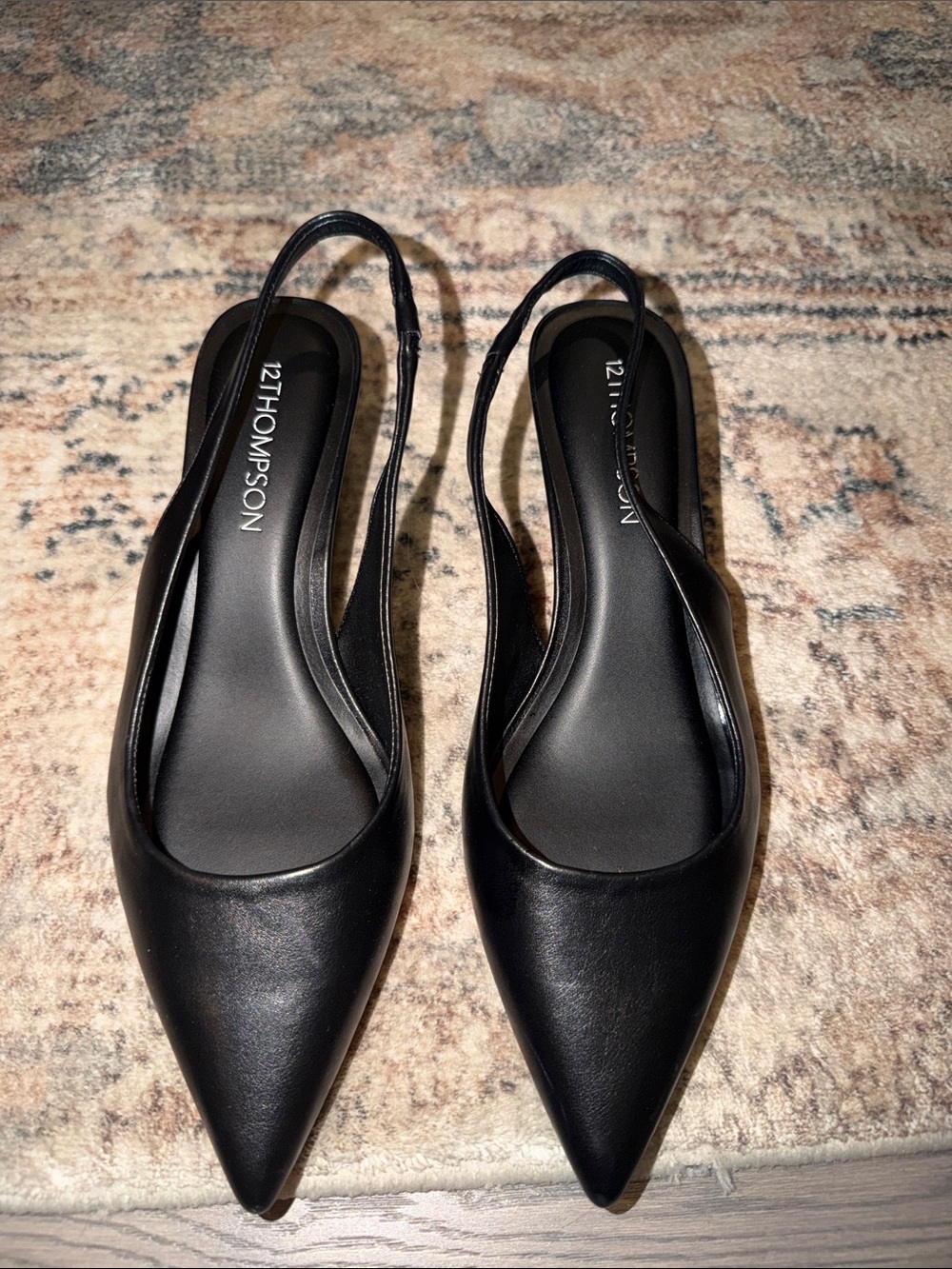 12 Thompsonw Black Pointed Slingback Heels